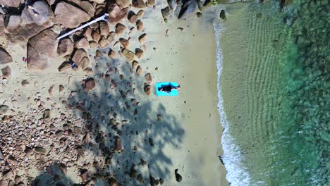 Woman-lies-on-the-beach-lonely-dream-island