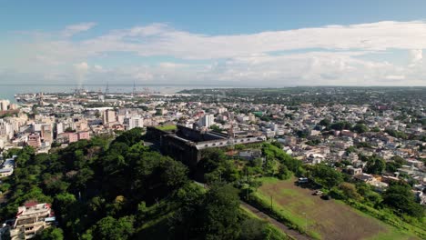 Citadel-fort-adelaide-overlooking-port-louis,-mauritius,-with-cityscape-and-clear-skies,-aerial-view