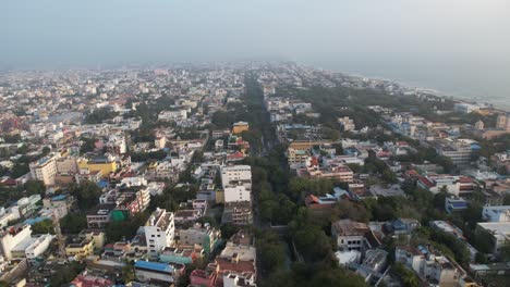 Aerial-footage-taken-early-in-the-morning-showing-the-entirety-of-Puducherry,-known-as-Pondicherry,-one-of-the-oldest-French-colonies-and-several-historic-buildings