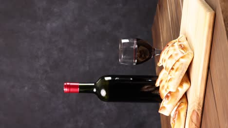 Chilean-wine-glasses-and-bottle-and-empanadas-variety