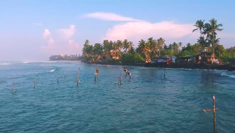 Aerial-View-Of-Stilt-Fisherman-In-Waters-Off-Ahangama-In-Sri-Lanka