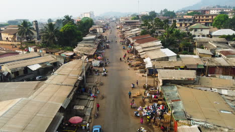 Aerial-view-over-the-streets-of-Ebolowa-city,-hazy-evening-in-south-Cameroon