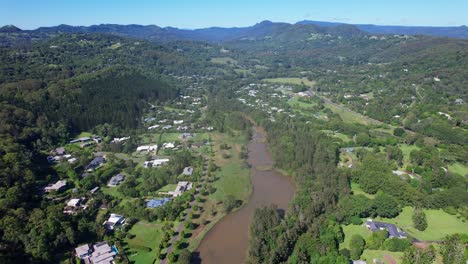 Residential-Area-With-River-In-Currumbin-Valley,-Gold-Coast,-QLD,-Australia---Aerial-Drone-Shot