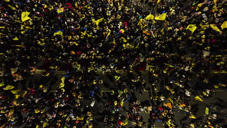 Top-down-drone-shot-above-soccer-champion-celebrations-in-downtown-Mexico-city