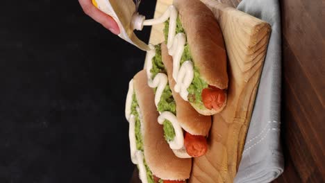 Chilean-Typical-Completo-Food-Hoy-dog-with-tomato,-avocado-palta-and-mayonnaise-Selective-Focus