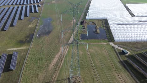 Poste-De-Energía-Utilidad-Línea-Eléctrica-Alto-ángulo-Aéreo-Drone-Lámina-Túnel