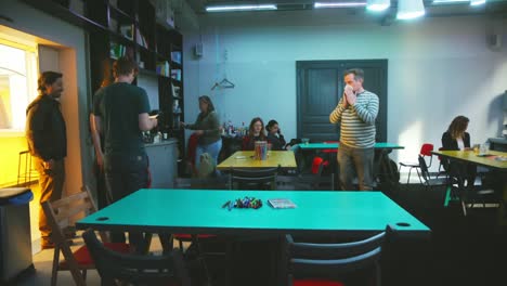 Persons-entering-classroom,-meeting-room-and-lab-indoors-handheld-slowmotion