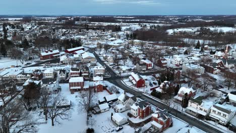 Aerial-360-of-small-town-America-covered-in-snow