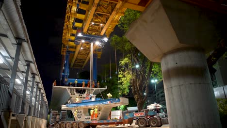 Nighttime-timelapse-of-bridge-construction-in-Argentina-with-workers-and-cranes