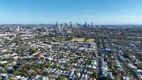 Establishing-drone-shot-of-Brisbane-City,-Newmarket-Shopping-Village,-Grange-and-Lutwyche