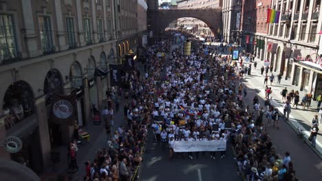 People-"marching-for-those-who-can't"-in-Stockholm-Pride-Parade-2019,-seen-from-a-bridge-above
