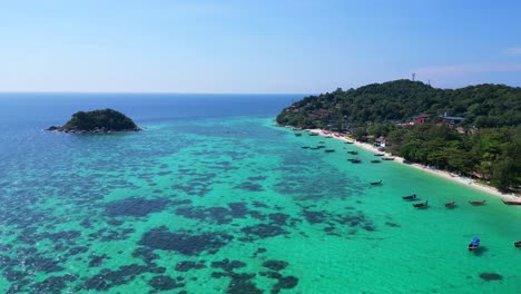 dream-beach-longtail-boats-in-turquoise-water