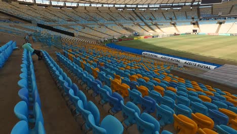 Rio-de-Janeiro,-Brazil,-Maracana-Football-Stadium,-Pan-From-Empty-Grandstand-to-Green-Grass-Field