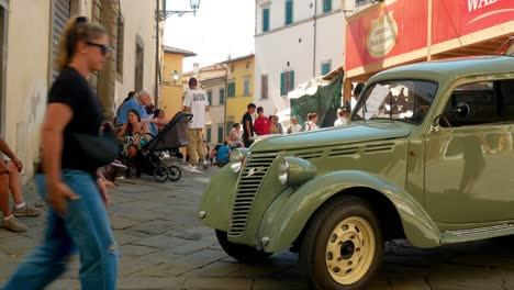 An-antique-truck-parked-on-display-in-the-middle-of-the-street-at-The-Suckling-Pig-Festival-Of-Monte-San-Savino