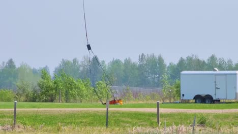 Helibucket---Bucket-On-a-Cable-Carried-By-Helicopter-To-Deliver-Water-For-Aerial-Firefighting