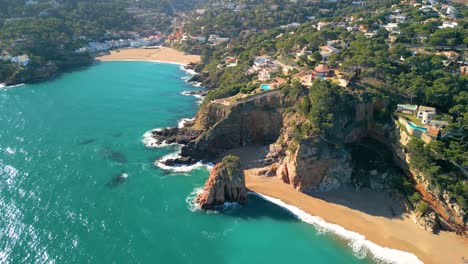 Tropical-beach-on-the-Costa-Brava-of-Gerona-with-the-Mediterranean-sea-red-island-beach