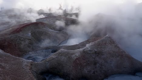 Mud-pots-boil,-steam-at-Sol-de-Manana-geysers-on-Bolivia-altiplano