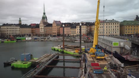 Construction-site-by-water-in-front-of-Old-Town-in-Stockholm