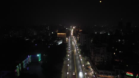 Rajkot-aerial-drone-view-phone-camera-behind-which-many-vehicles-are-going-four-wheeler-on-the-road