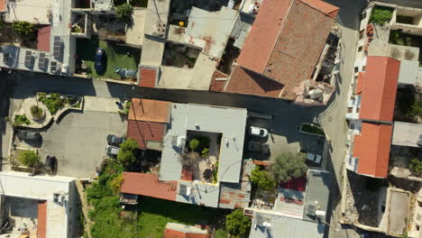 Orange-Roof-Houses-of-Pano-Lefkara-Village-in-Larnaca-District,-Cyprus---Aerial-Top-Down-Flyover