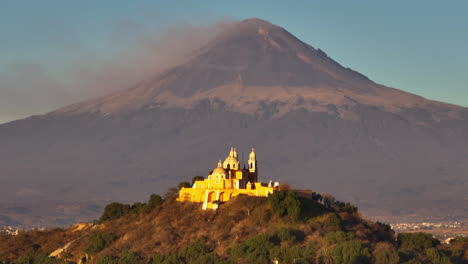 Nuestra-Señora-De-Los-Remedios-Cholula-With-A-Mountain-Background---Aerial-View
