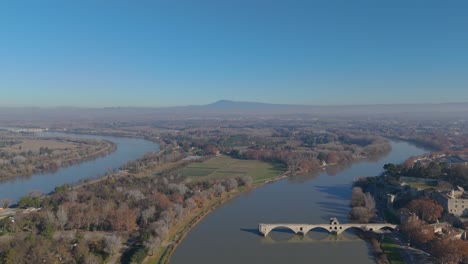 Meandering-Rhône-and-Avignon's-Ancient-Bridge---aerial-view