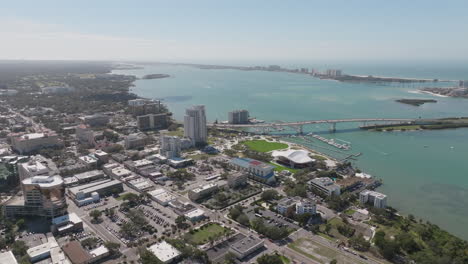 Aerial-view-looking-down-at-Downtown-Clearwater-and-Clearwater-Beach-across-Intracoastal-waters