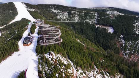 Aerial-view-of-sky-walk-tower-and-sky-bridge-suspension-footbridge,-Dolni-Morava
