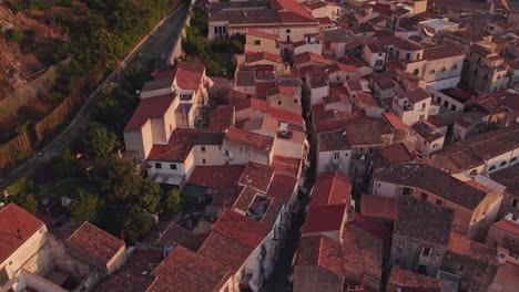 Aerial-view-of-Cefalu-medieval-city-during-summer-at-sunset,-Sicily,-Italy
