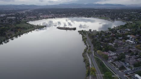 A-4K-high-flying-drone-shot-of-Sloan’s-Lake,-the-biggest-lake-in-the-city-of-Denver,-Colorado,-and-home-to-the-second-largest-park-in-the-city,-and-a-myriad-of-outdoor-activities