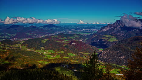 Nature-landscape-time-lapse-elevated-view-mountains-hills-clouds-green-fields