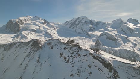 Gornergrat-Bahnhof-4k-Filmische-Drohnenaufnahme---Zermatt---Schweiz