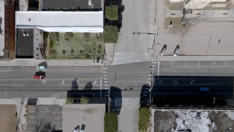 Traffic-intersection-in-Sweetwater,-Texas-with-drone-video-overhead-and-looking-down