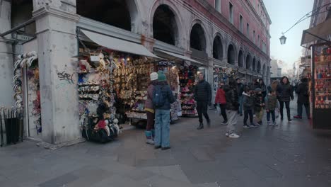 Bustling-Venetian-market-street-with-tourists-and-shops