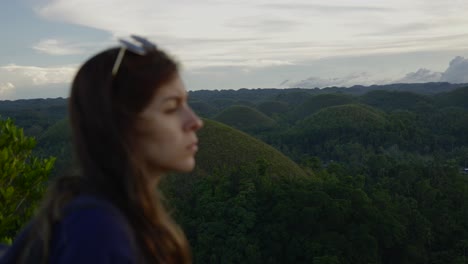 Female-tourist-visiting-Bohol-tropical-hills-in-Philippines