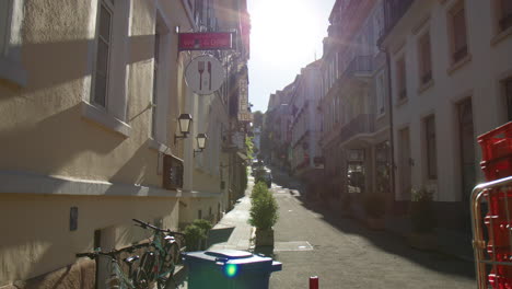 Hotel-And-Store-Buildings-Along-Narrow-Street-On-Sunny-Day-In-Baden-Baden,-Germany
