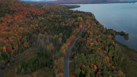 drone-shot-revealing-a-typical-canadian-landscape-during-fall,-Quebec-province,-Lanaudiere-region,-Saint-Donat-Mont-Sourire