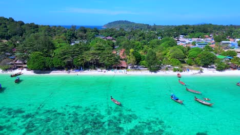 dream-beach-longtail-boats-in-turquoise-water