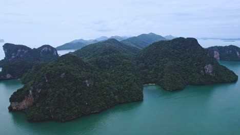 Aerial-Top-Down-View-at-Kian-Bay-Cove-Surrounded-by-Green-Lush-Trees-on-a-Tropical-Island-Koh-Yao-Noi-in-Thailand