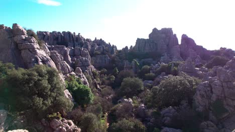 Drone-flying-forward-on-the-nature-reserve-at-El-Torcal-de-Antequera,-Malaga,-Andalusia,-Spain
