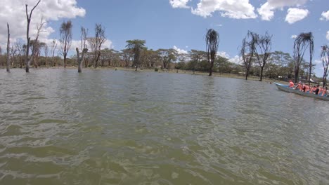 Boat-ride-on-Lake-Naivasha-in-Kenya,-Africa,-tourists-observing-wild-nature