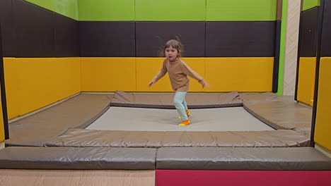 Active-child-girl-jumps-on-a-trampoline-alone