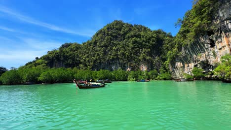 Lagoon-south-of-Thailand-surrounded-by-steep-limestone,-turquoise-water