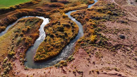 Aerial-View-Of-Winding-River-Stream-At-Capitol-Reef-National-Park-In-South-central-Utah