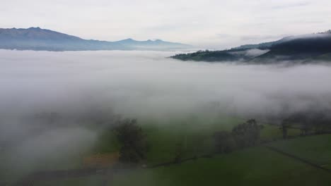 Cinematic-aerial-drone-clip-flying-over-the-countryside-with-mountains-and-exceptional-view-around-in-the-area-of-Neblina,-Pichinchas,-Machachi-in-Equador