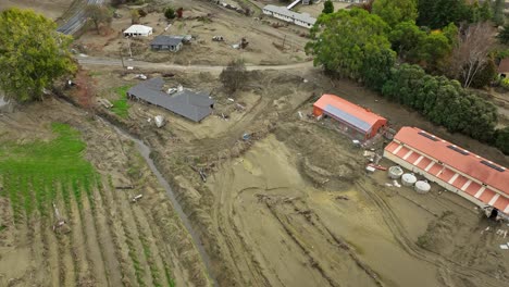 Rural-farm-land-destroyed-by-cyclone-Gabrielle-in-New-Zealand,-aerial