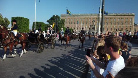 Slow-motion-footage-of-the-Swedish-Royal-Family-in-a-horse-drawn-carriage-on-National-Day-in-Stockholm