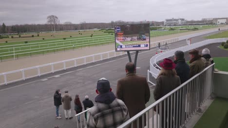 public-watching-a-racehorse-competition-from-the-grandstand