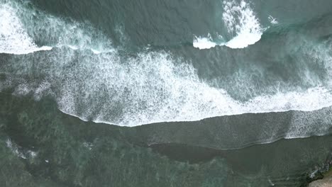 Drone-fly-over-sea-waves-on-the-beach