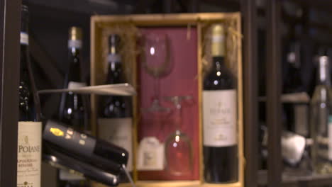 Luxury-wine-box-with-expensive-bottles-and-glasses,-dolly-in
